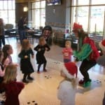 Carol leads kids in interactive games